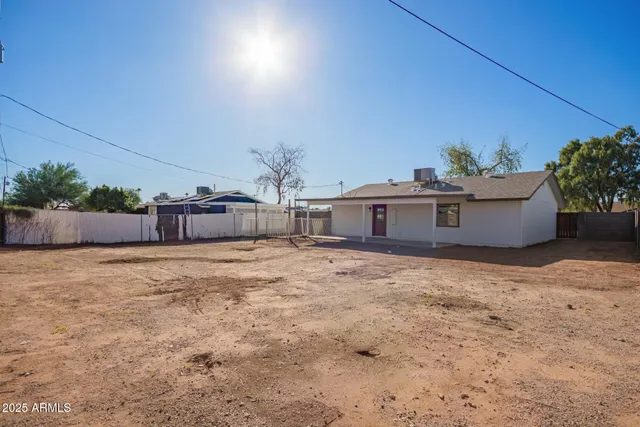 a view of a room with a flat screen tv