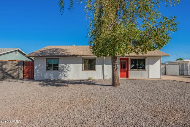 a front view of a house with a garage