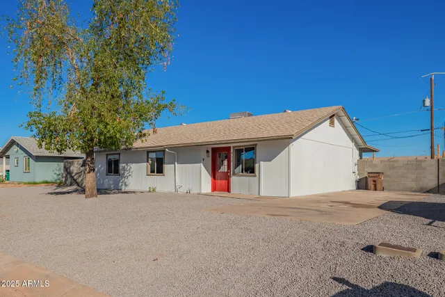 a view of a house with a patio