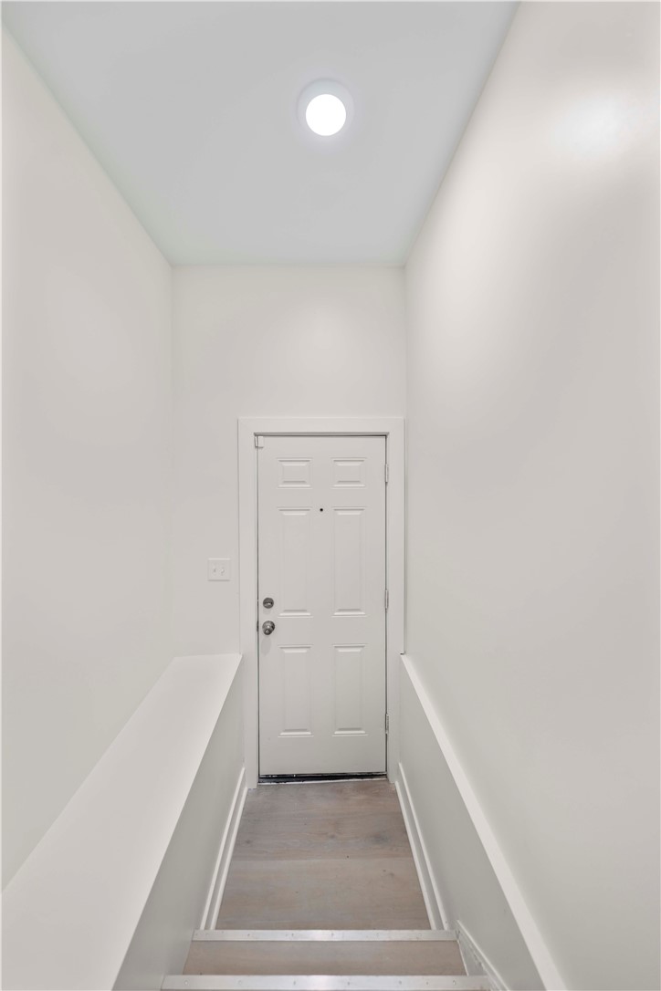 61 Lime Street Rochester, NY 14606 - Photo 22 of 35 Stairwell to upper unit