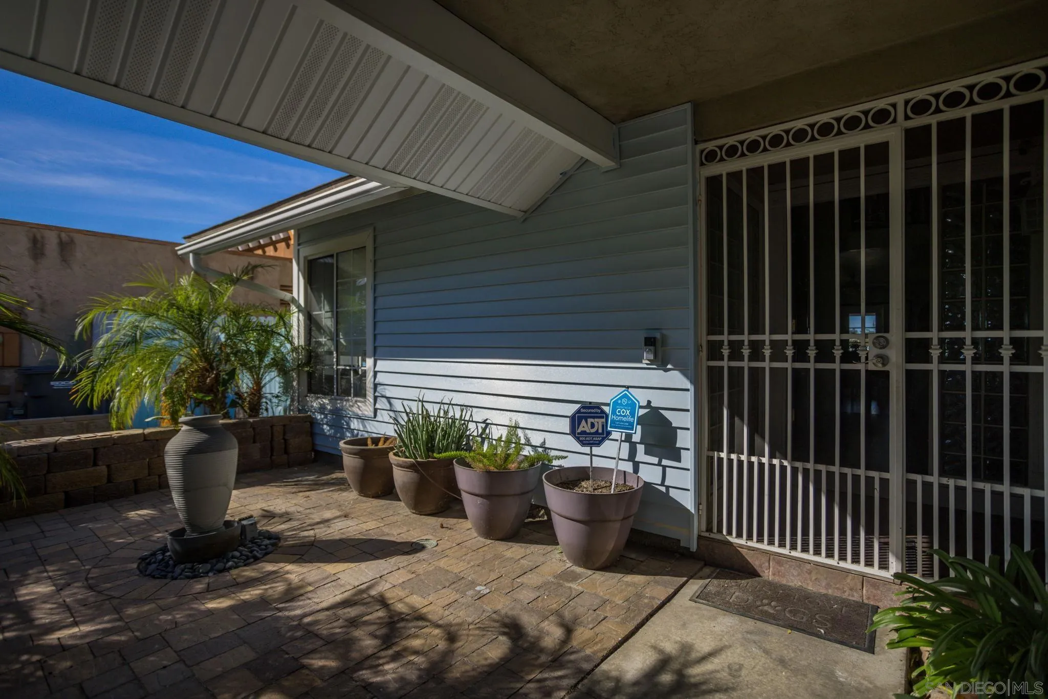 532 Kempton Street Spring Valley, CA 91977 - Photo 3 of 30 a view of a balcony with potted plants