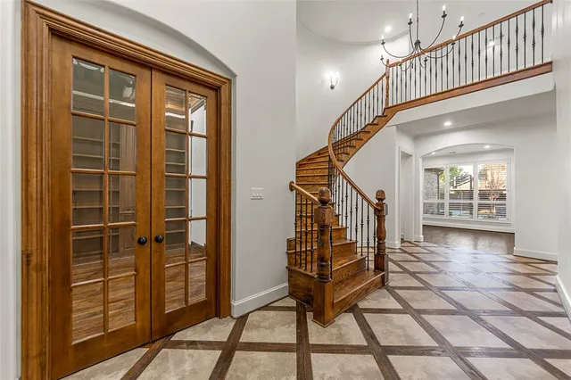 a view of staircase with a rug