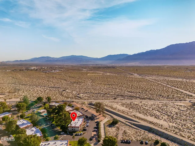 a view of lake with mountain