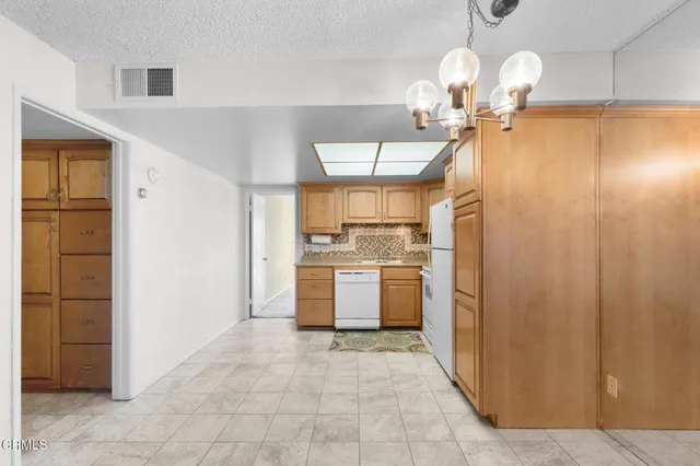 a view of a kitchen with a sink