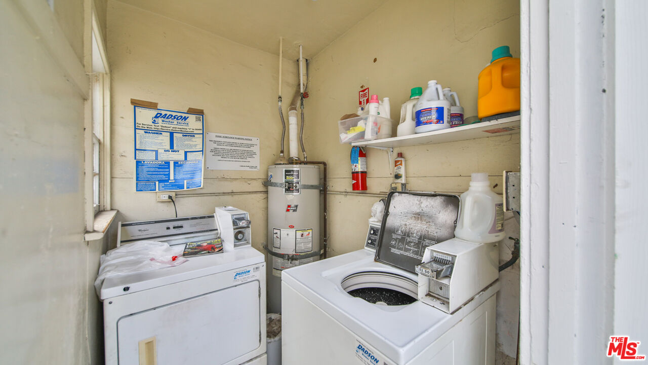 1502 Maple Street Santa Monica, CA 90405 - Photo 11 of 16 a utility room with dryer and washer