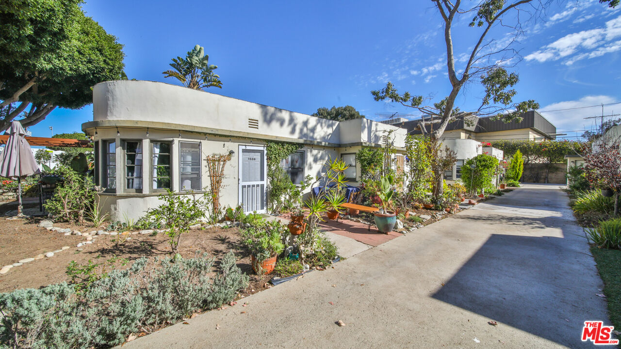 1502 Maple Street Santa Monica, CA 90405 - Photo 8 of 16 a view of a house with backyard and sitting area