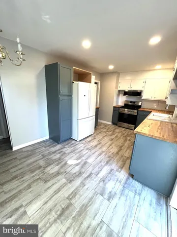 a view of a kitchen with a sink