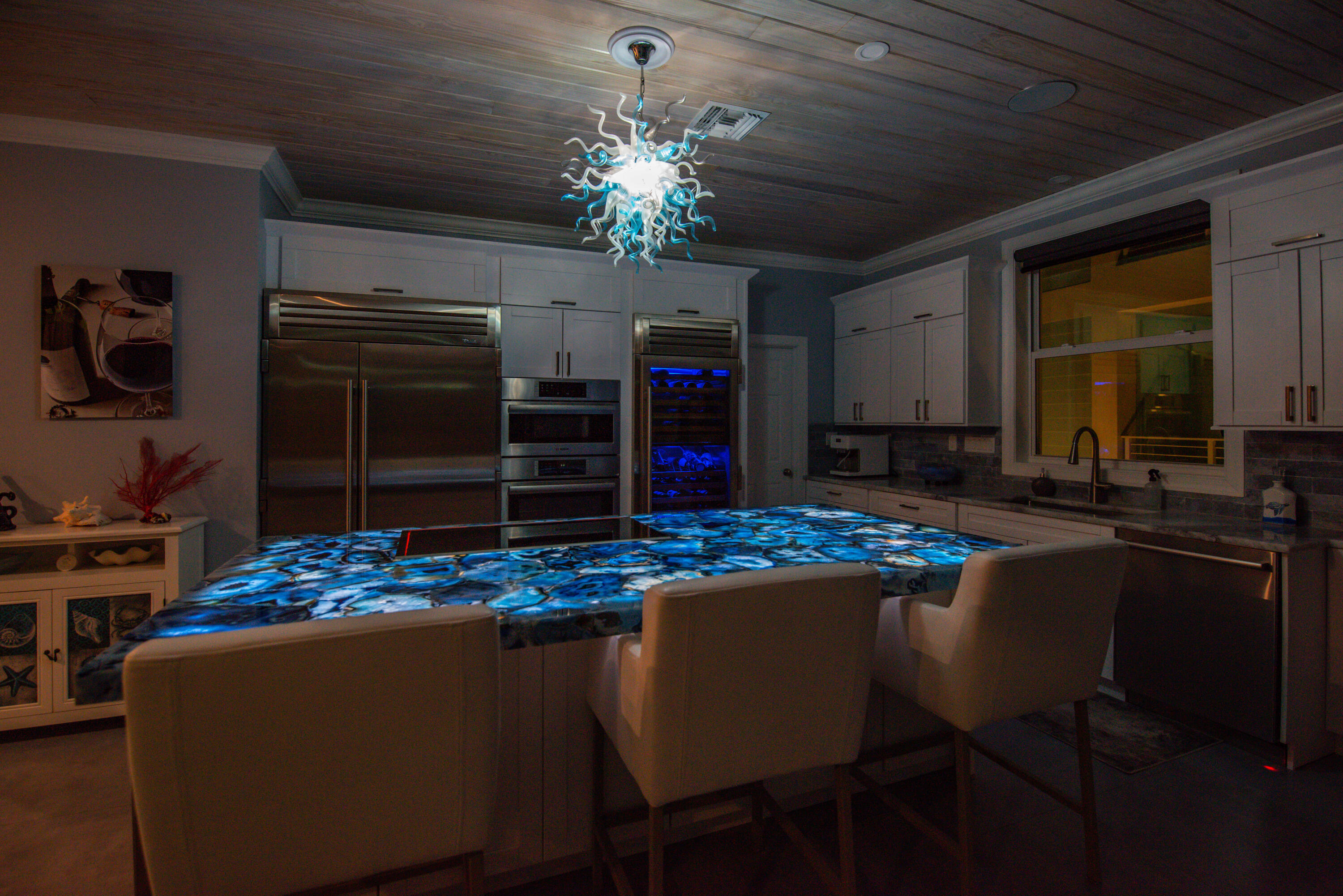 747 La Fitte Road Summerland Key, FL 33042 - Photo 85 of 103 a view of a dining room with furniture and chandelier