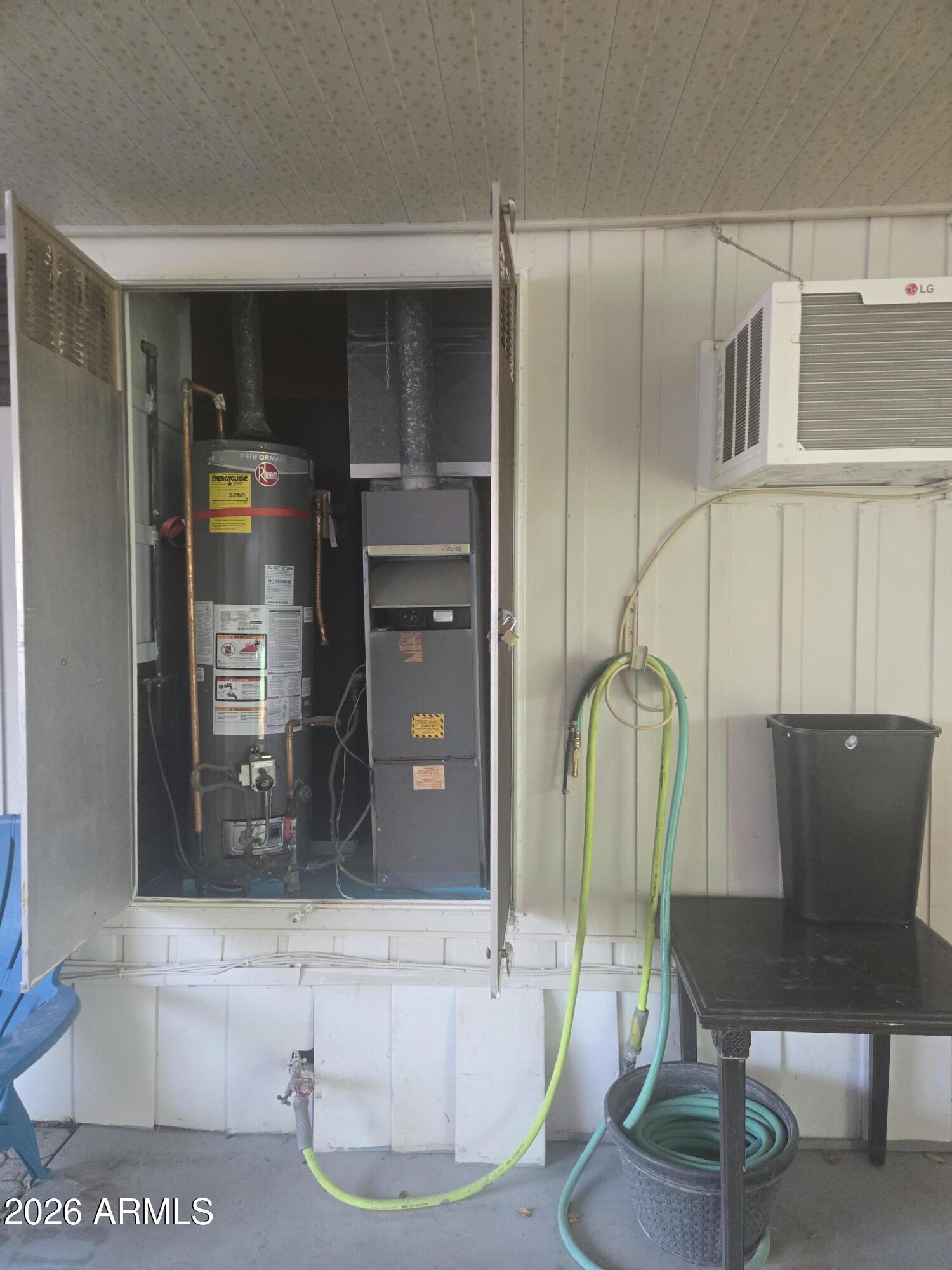269 North Winchester Road, Unit 26 Apache Junction, AZ 85119 - Photo 15 of 18 a view of a living room with furniture and wooden floor