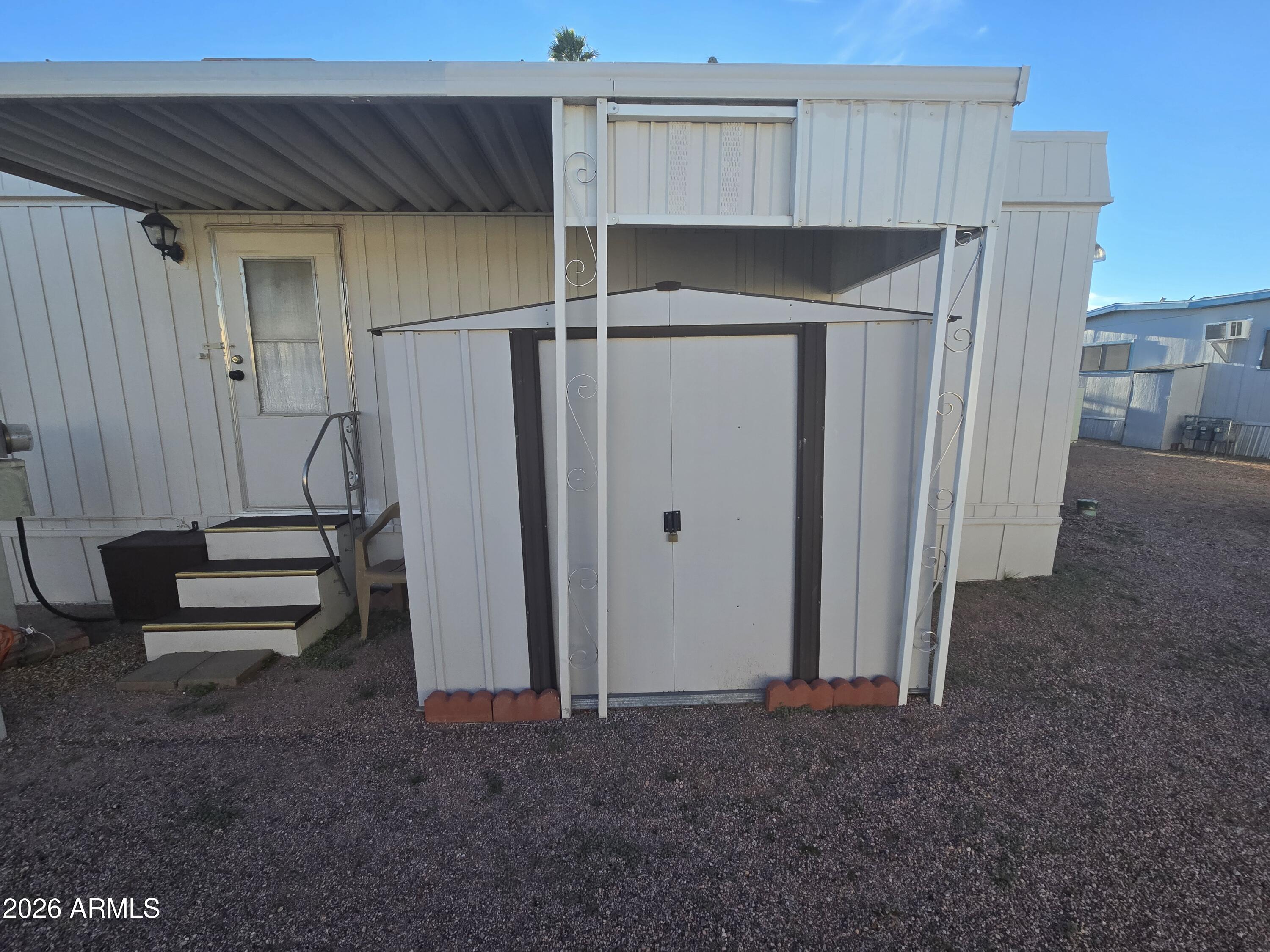 269 North Winchester Road, Unit 26 Apache Junction, AZ 85119 - Photo 16 of 18 a view of storage and utility room
