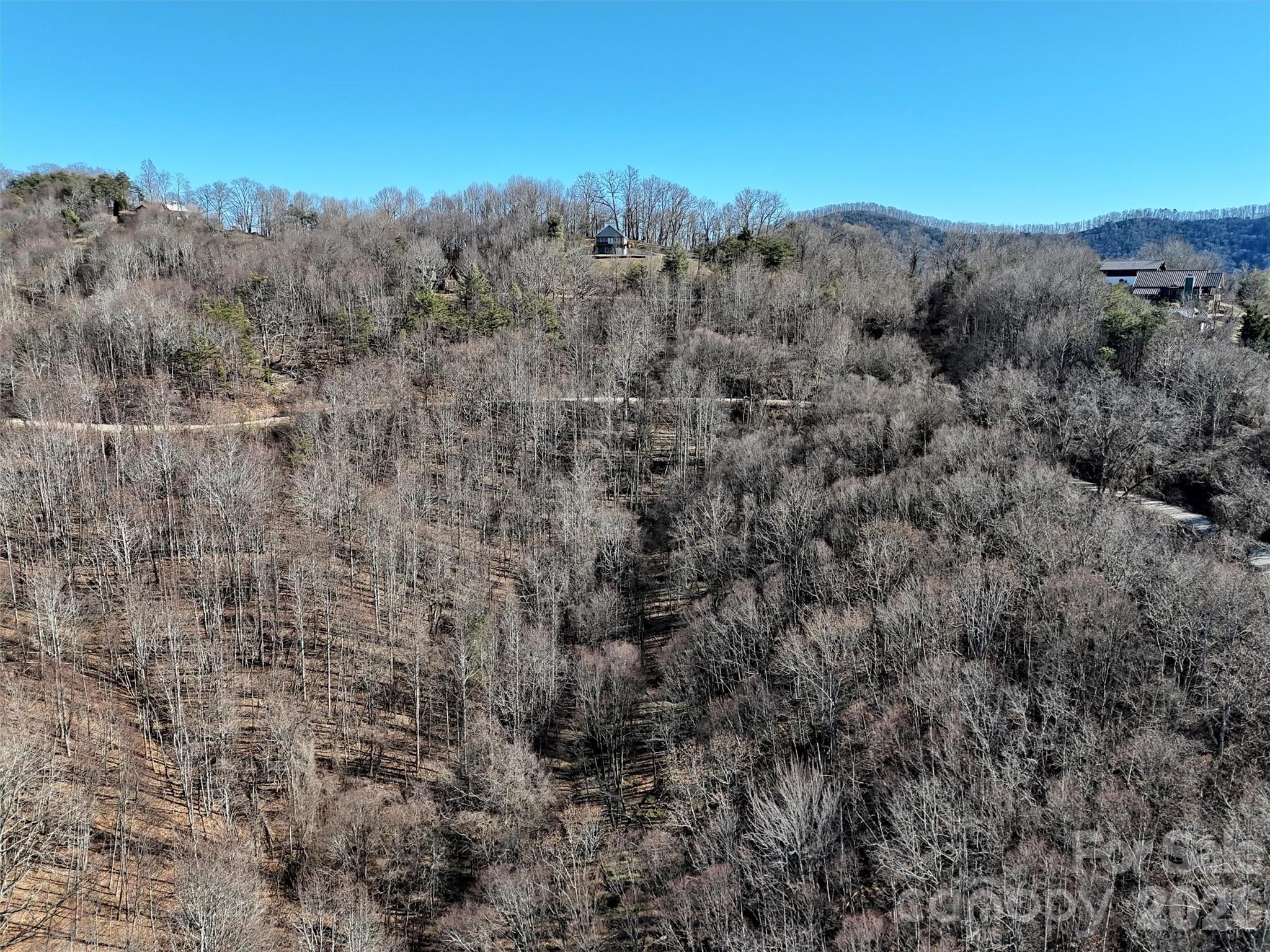 0 Hunters Ridge Road, Unit 62 63 64 Canton, NC 28716 - Photo 6 of 13 a view of a dry yard with mountains in the background