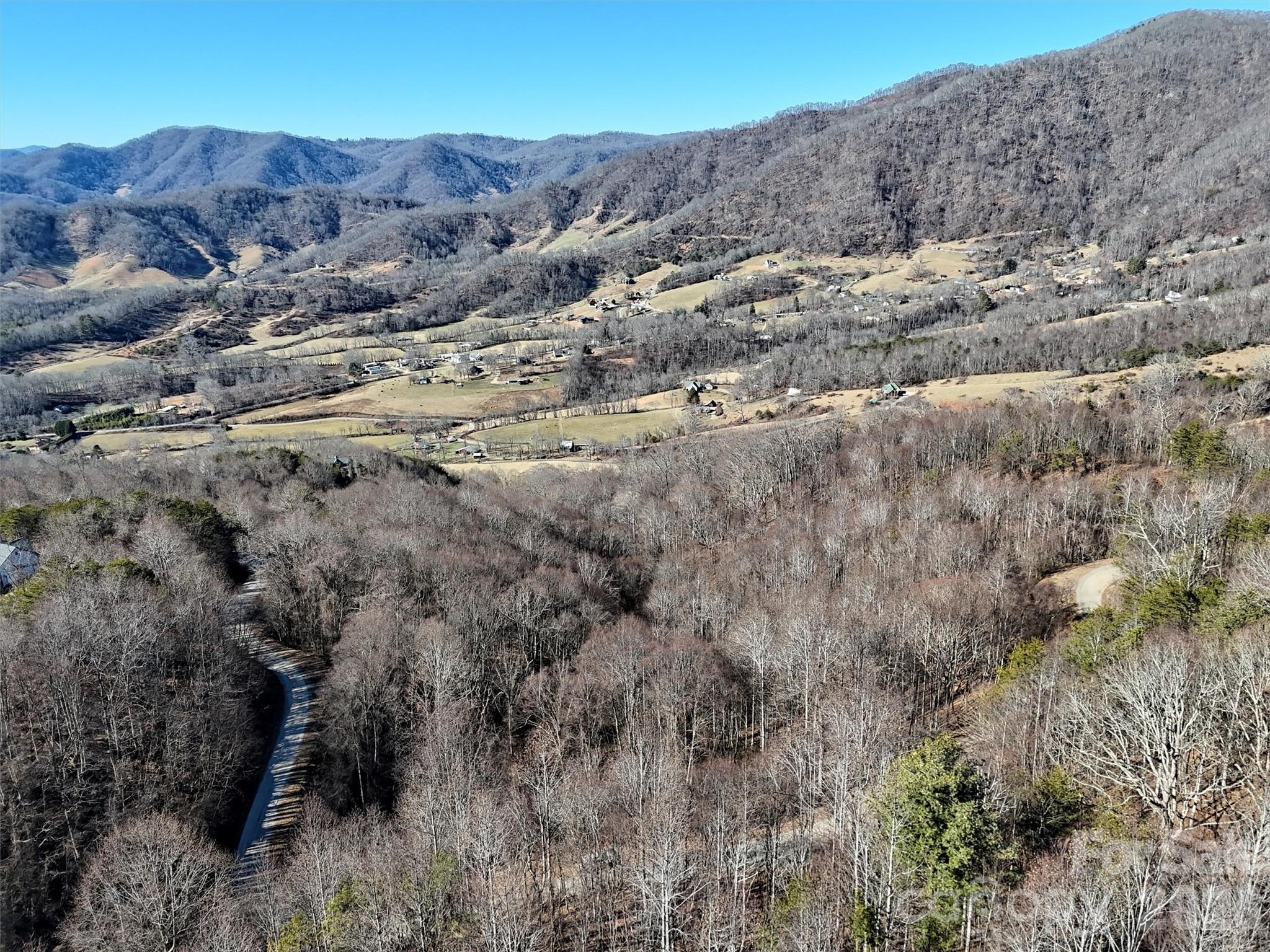 0 Hunters Ridge Road, Unit 62 63 64 Canton, NC 28716 - Photo 10 of 13 a view of a dry field with trees in background