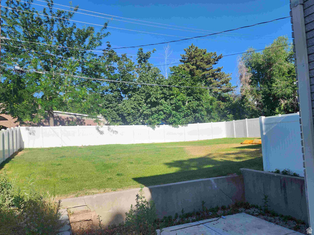 545 100 East Bountiful, UT 84010 - Photo 17 of 17 Fenced backyard with a patio area
