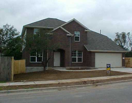 9000 Ovalla Drive Austin, TX 78749 - Photo 1 of 1 a front view of a house with a yard