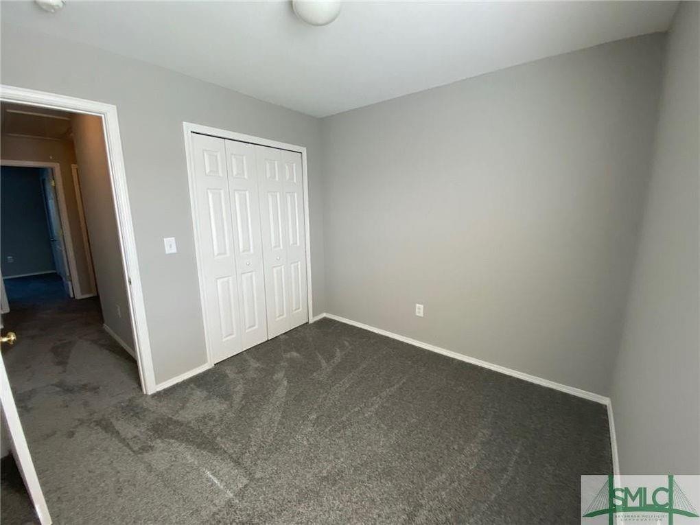 57 Timber Crest Court Savannah, GA 31407 - Photo 11 of 22 an empty room with windows