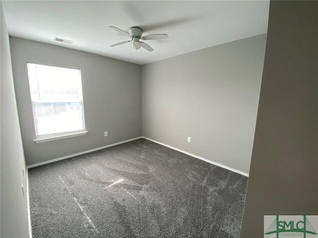 57 Timber Crest Court Savannah, GA 31407 - Photo 13 of 22 an empty room with a window