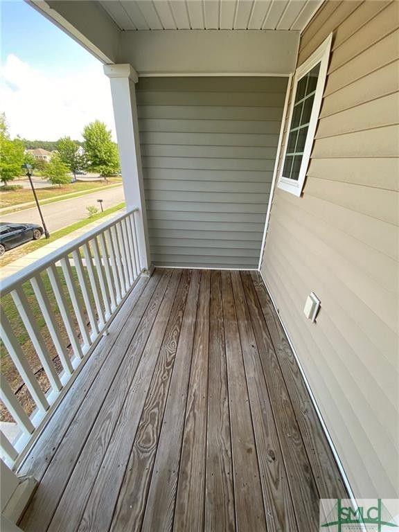 57 Timber Crest Court Savannah, GA 31407 - Photo 17 of 22 a view of a balcony with wooden floor