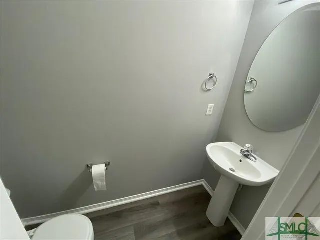 a park with lots of trees and buildings