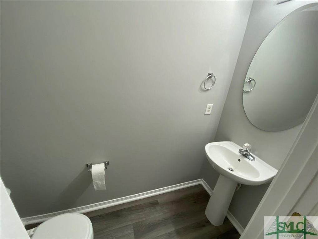 57 Timber Crest Court Savannah, GA 31407 - Photo 18 of 22 a bathroom with a sink mirror and toilet