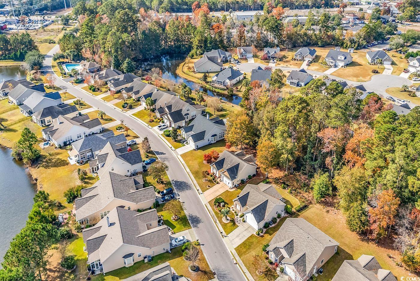 153 Myrtle Grande Drive Conway, SC 29526 - Photo 32 of 40 Aerial overview of property's location featuring nearby suburban area and a nearby body of water