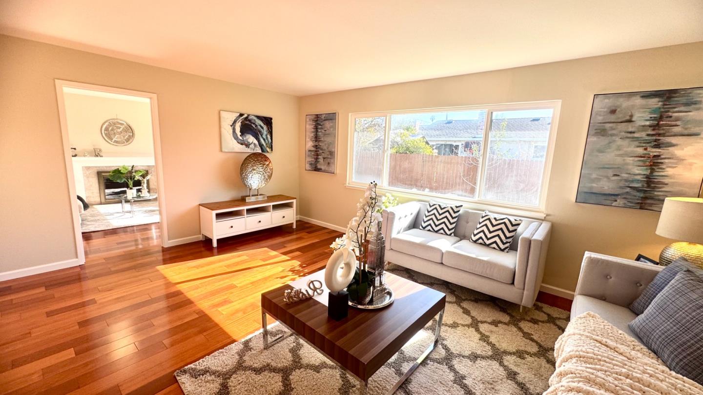 802 Humewick Way Sunnyvale, CA 94087 - Photo 3 of 11 a living room with furniture and a floor to ceiling window