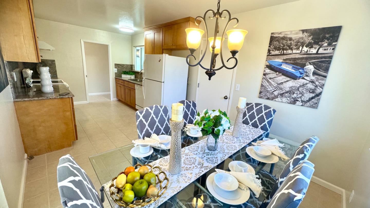 802 Humewick Way Sunnyvale, CA 94087 - Photo 4 of 11 a dining room with furniture and chandelier