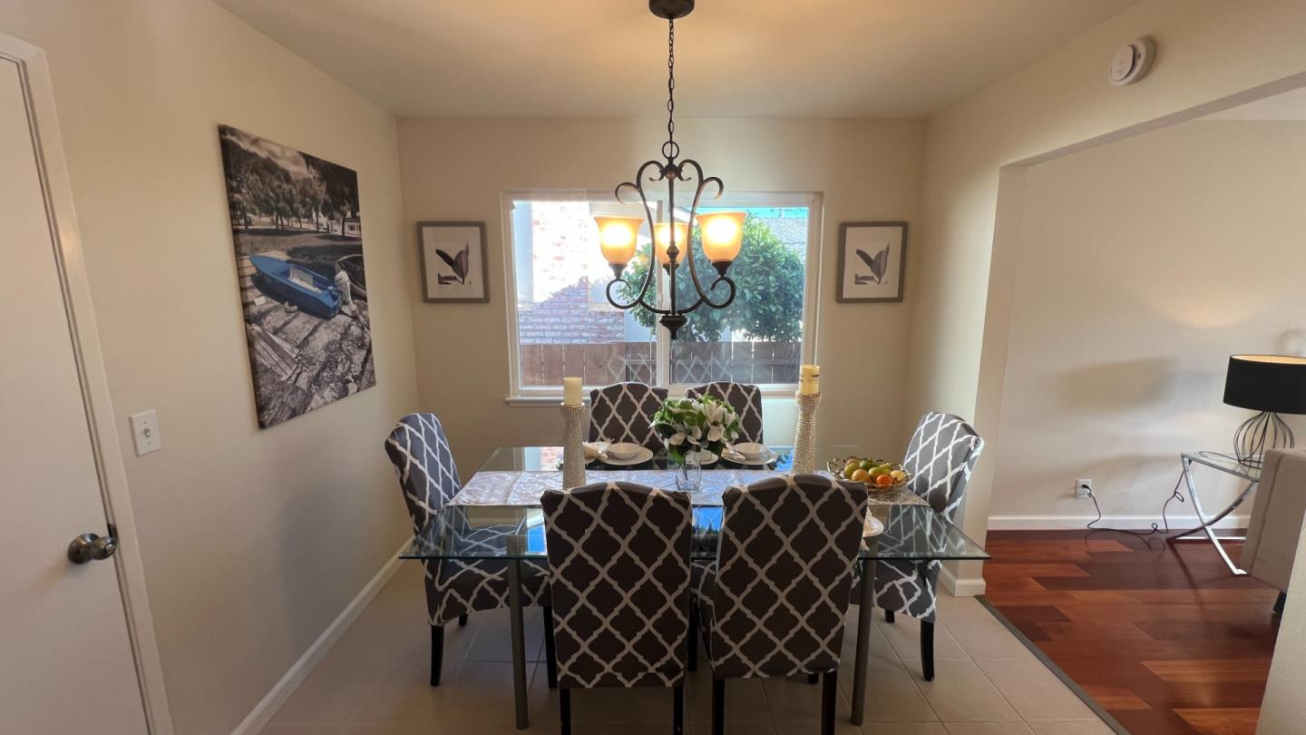 802 Humewick Way Sunnyvale, CA 94087 - Photo 5 of 11 a view of a dining room with furniture and chandelier