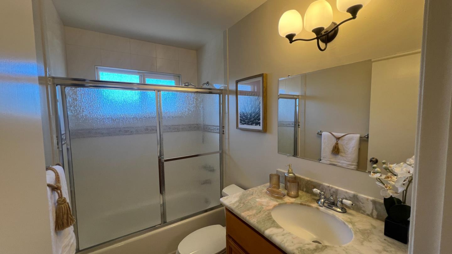 802 Humewick Way Sunnyvale, CA 94087 - Photo 9 of 11 a bathroom with a sink toilet and shower