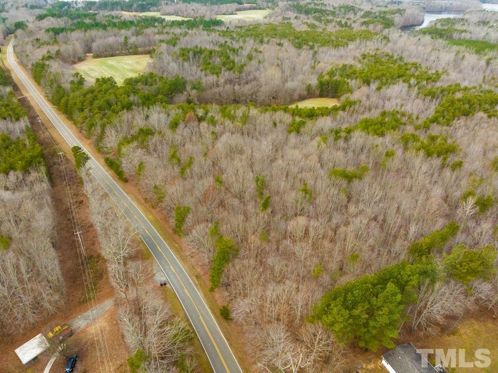 0 Bowmantown Road, Unit TRACT A Roxboro, NC 27574 - Photo 12 of 50 a view of a lake from a balcony