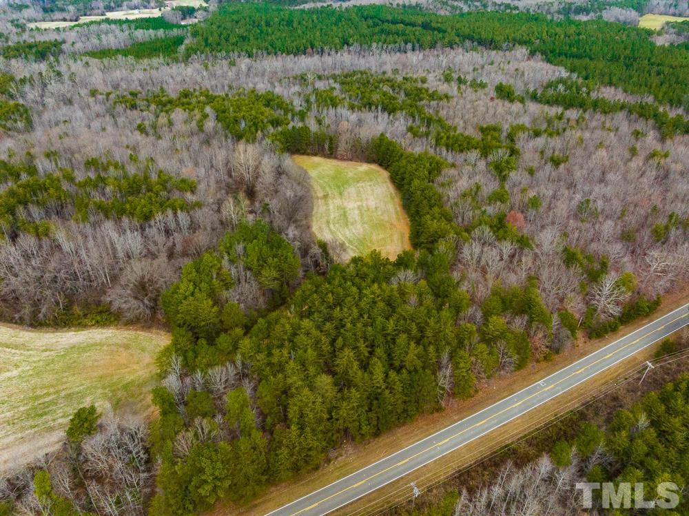 0 Bowmantown Road, Unit TRACT A Roxboro, NC 27574 - Photo 16 of 50 a view of a lake from a balcony