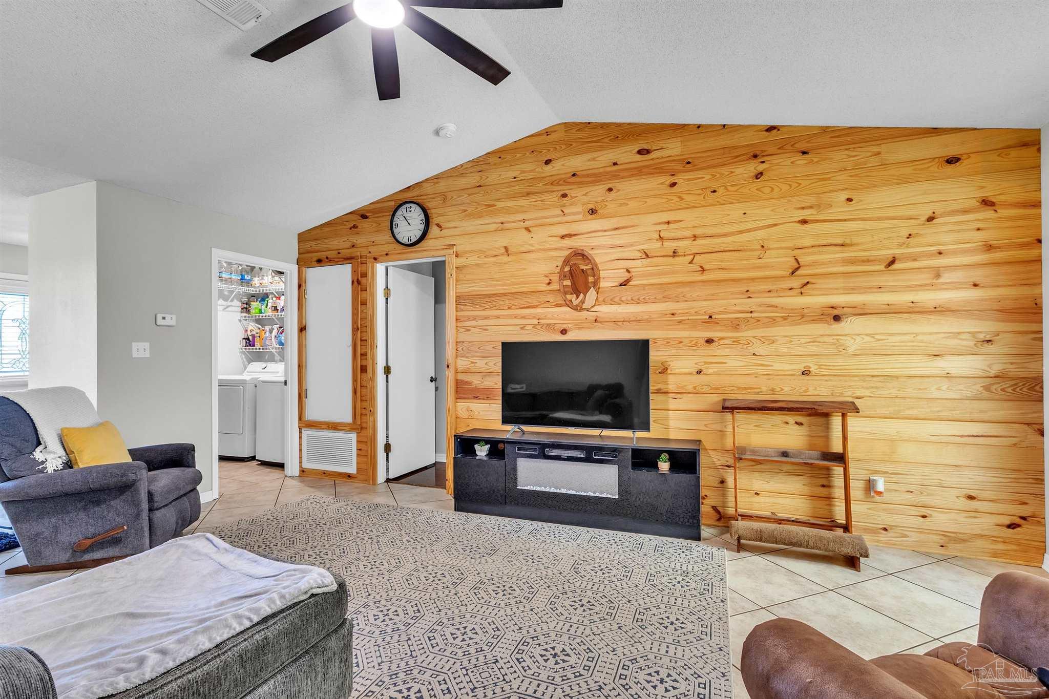 1770 Annie Penton Road Jay, FL 32565 - Photo 14 of 35 a living room with furniture and a flat screen tv