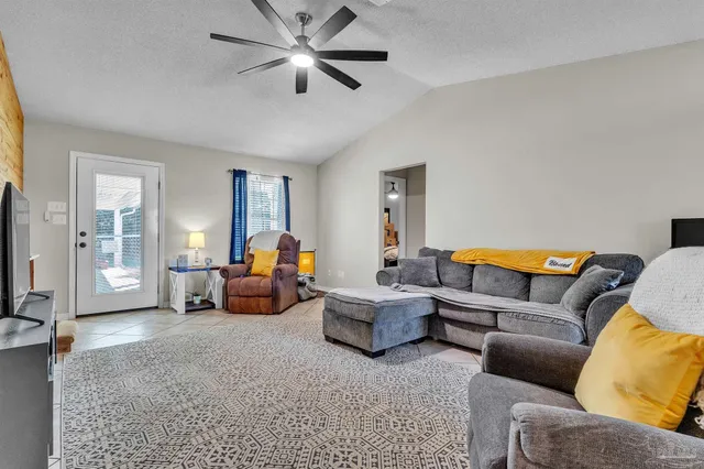 a living room with furniture and a couch