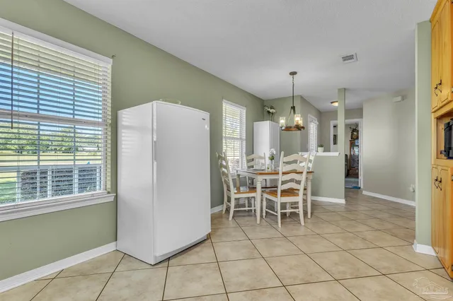 a dining room well furnished