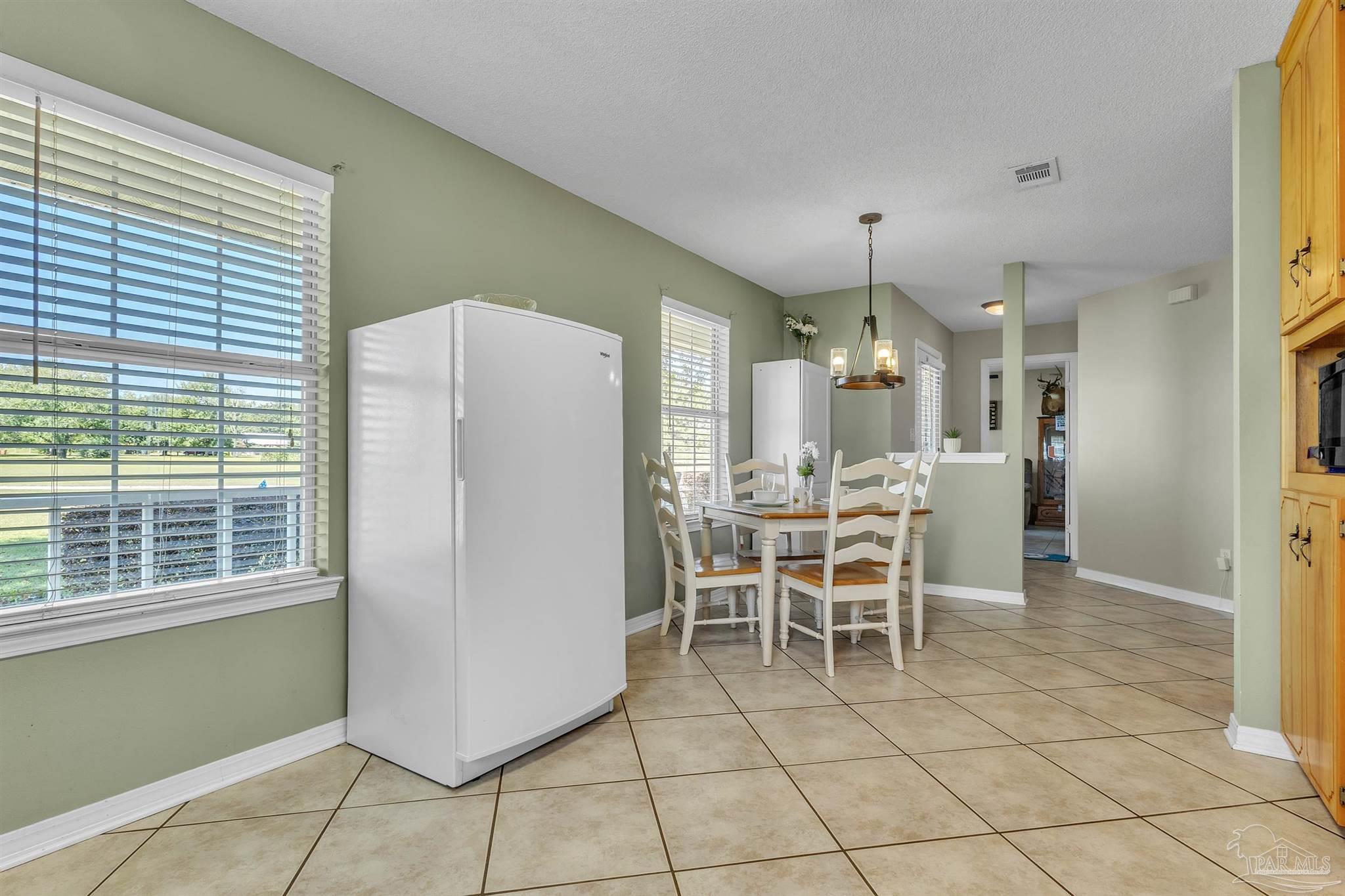 1770 Annie Penton Road Jay, FL 32565 - Photo 19 of 35 a dining room well furnished
