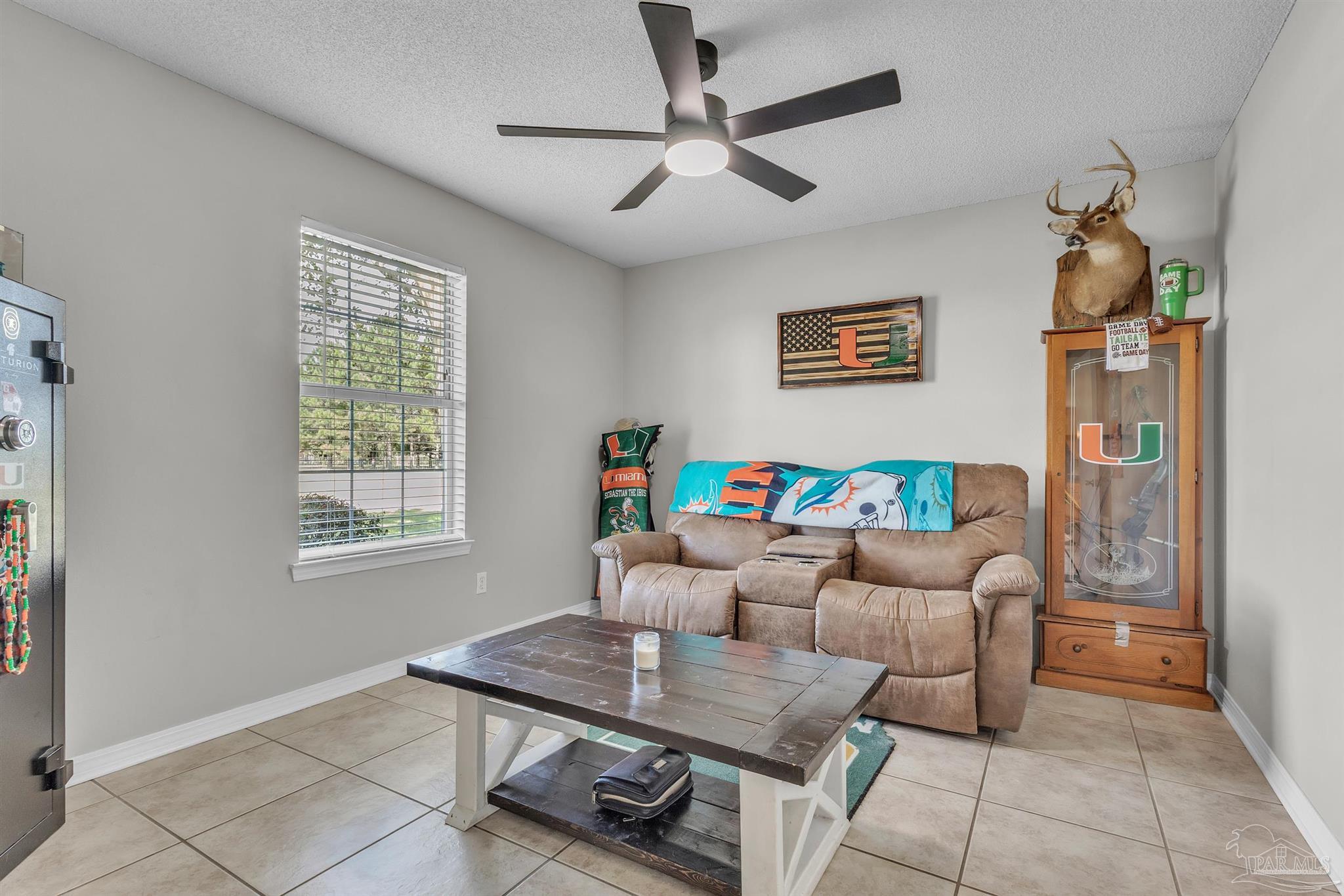 1770 Annie Penton Road Jay, FL 32565 - Photo 27 of 35 a living room with furniture and a window