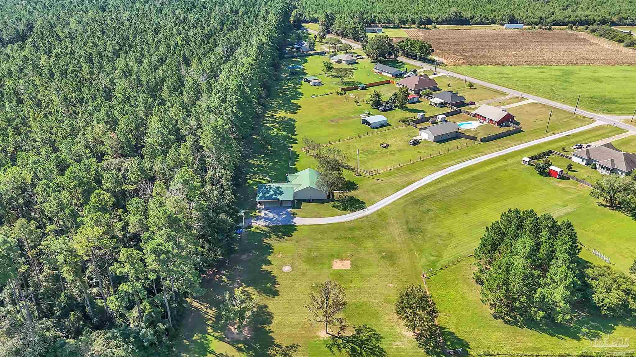 1770 Annie Penton Road Jay, FL 32565 - Photo 33 of 35 a view of a swimming pool with a yard