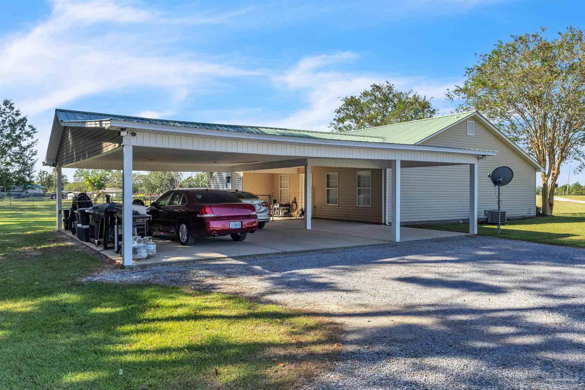 1770 Annie Penton Road Jay, FL 32565 - Photo 10 of 35 a view of a car park in front of house