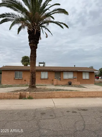 front view of a house with a street