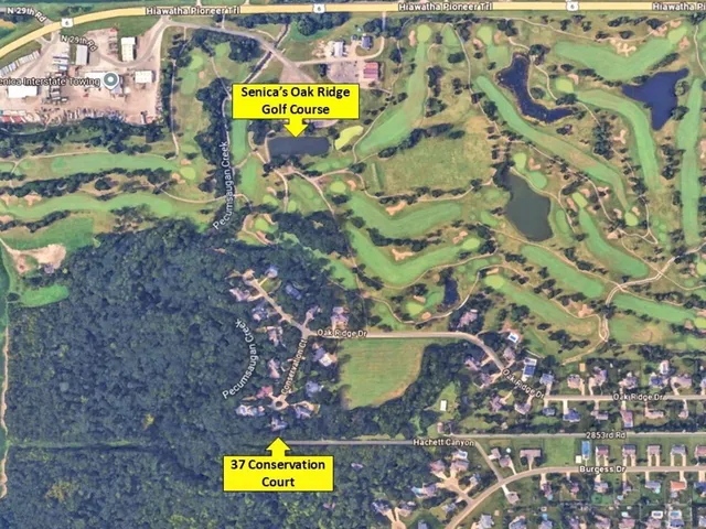 a store with outdoor seating area and utility pole