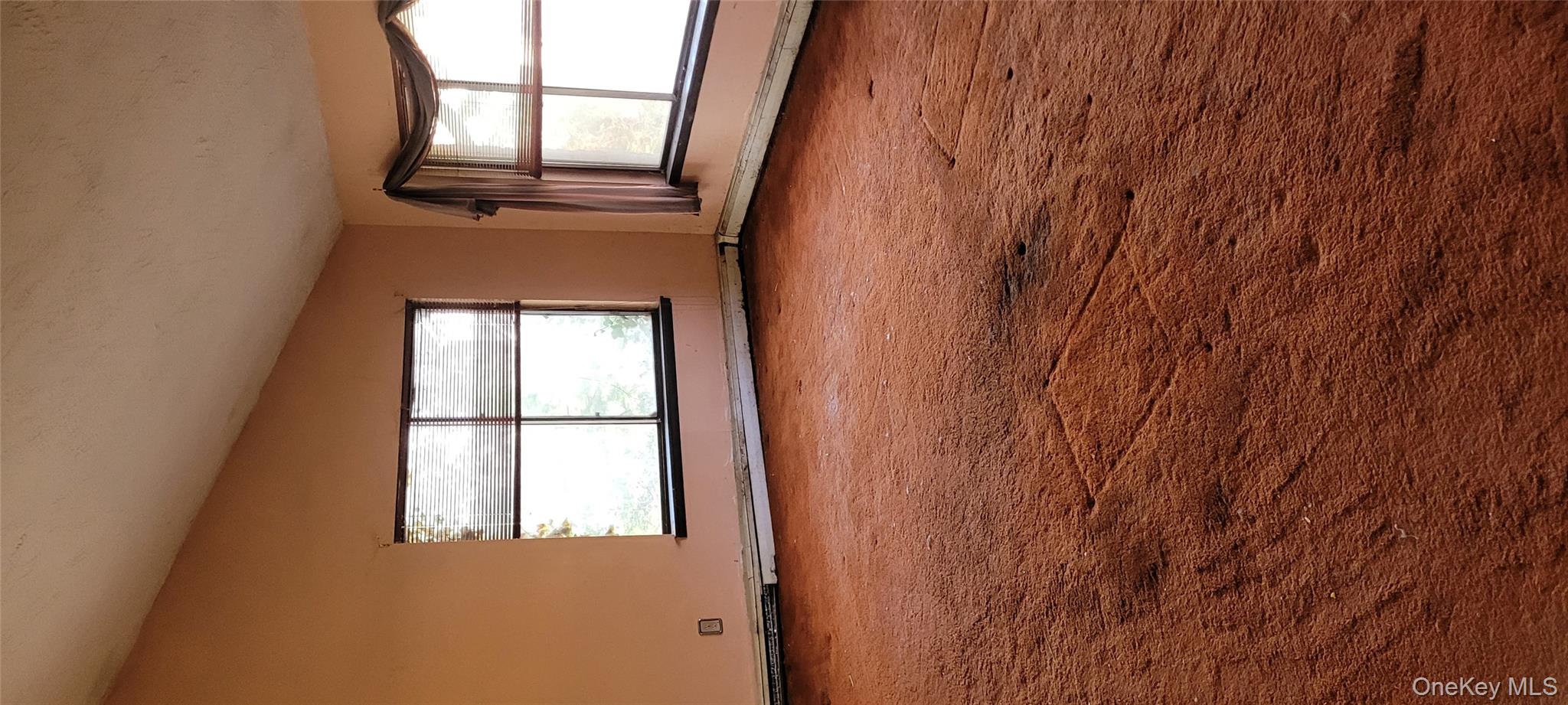 18 Kent Road Wappingers Falls, NY 12590 - Photo 11 of 30 an empty room with wooden floor and windows