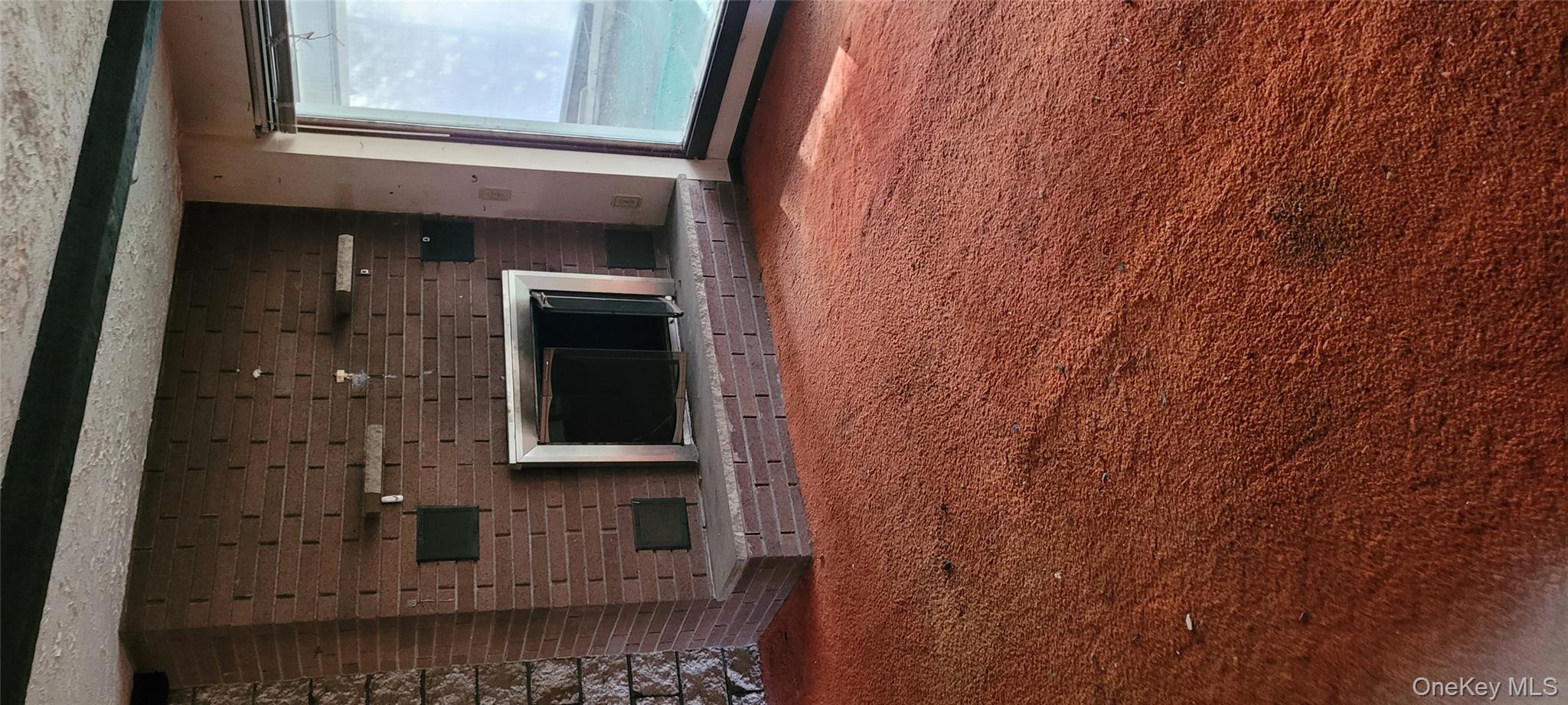 18 Kent Road Wappingers Falls, NY 12590 - Photo 30 of 30 a view of empty room with wooden floor and fireplace