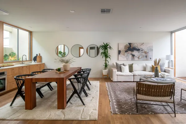 a living room with furniture and a table