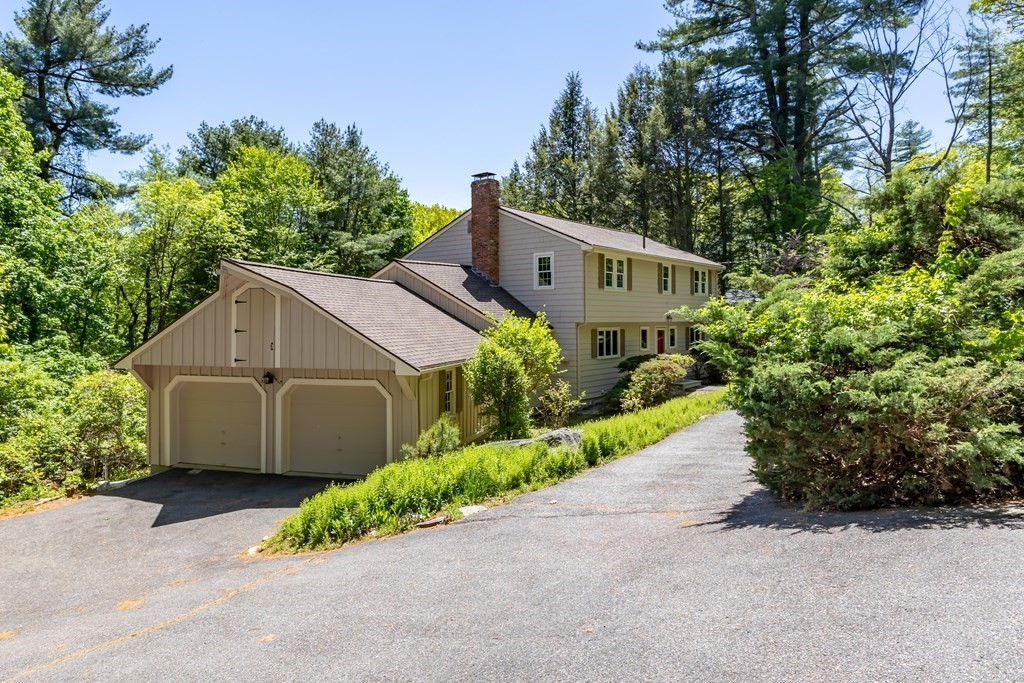 34 Duggan Road Acton, MA 01720 - Photo 2 of 42 a house view with a garden space