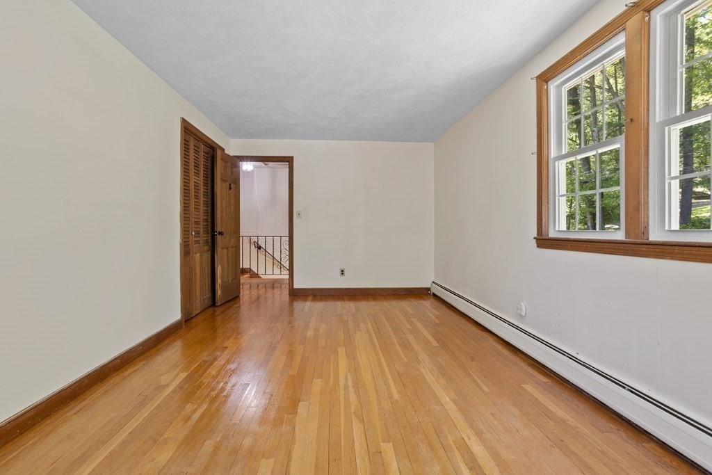 34 Duggan Road Acton, MA 01720 - Photo 25 of 42 a view of a room with wooden floor and natural light
