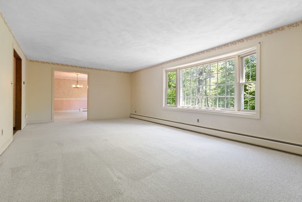 34 Duggan Road Acton, MA 01720 - Photo 4 of 42 an empty room with windows