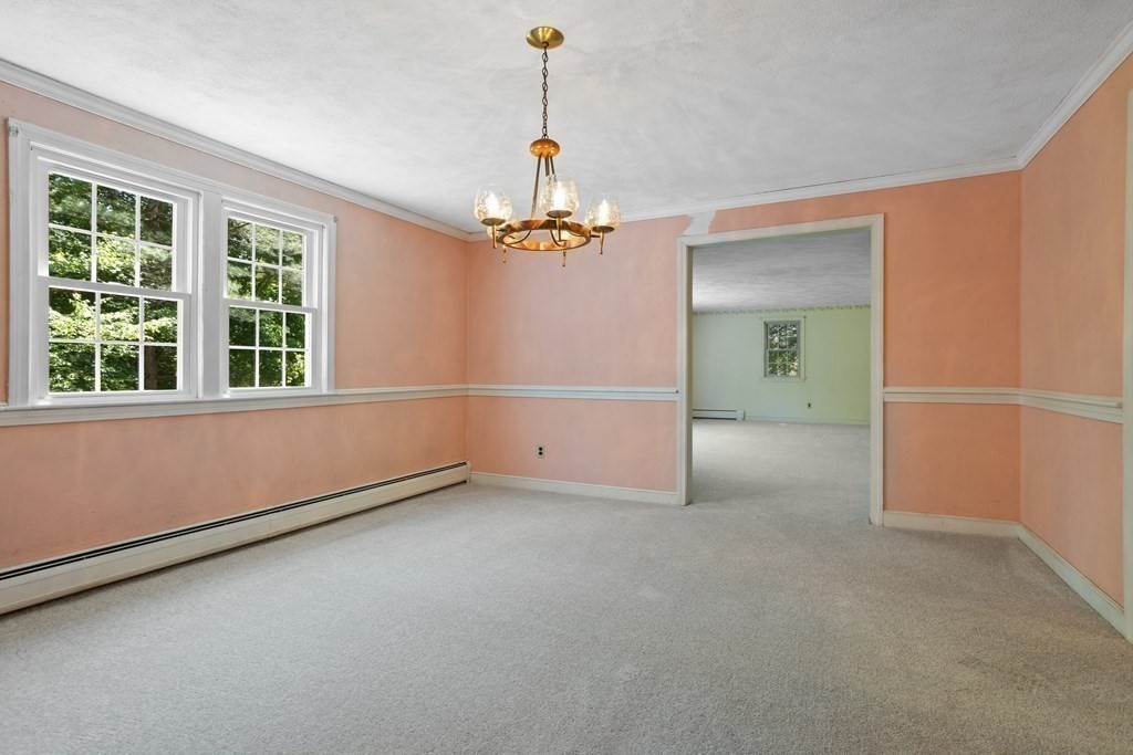 34 Duggan Road Acton, MA 01720 - Photo 6 of 42 a view of an empty room with a window