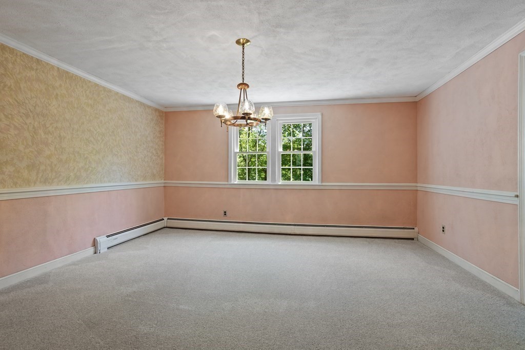 34 Duggan Road Acton, MA 01720 - Photo 7 of 42 an empty room with windows