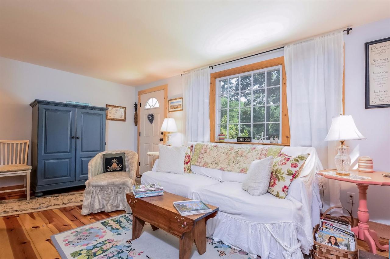 71 Wakeby Road Marstons Mills, MA 02648 - Photo 11 of 31 a living room with furniture and a window