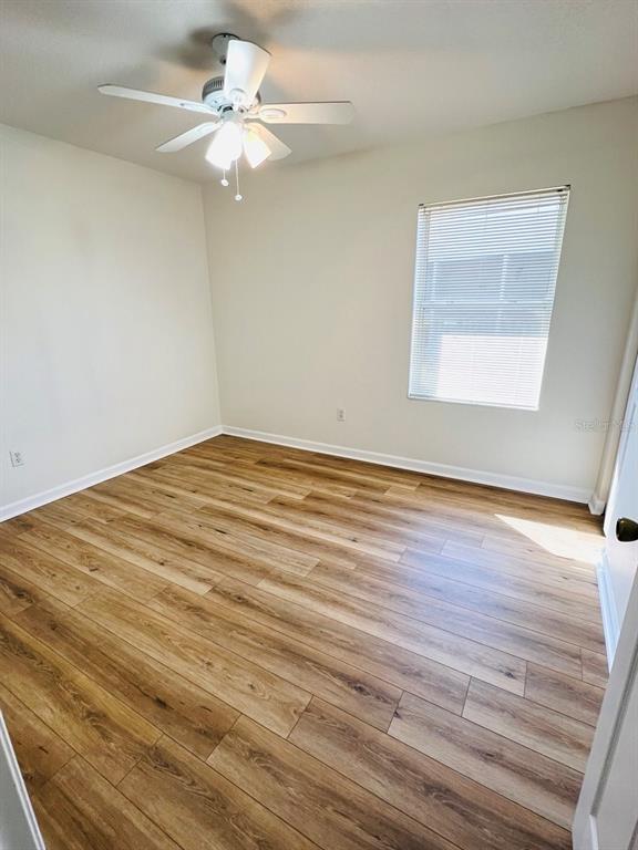 78 Plainview Drive, Unit B Palm Coast, FL 32164 - Photo 5 of 7 a view of an empty room with a window