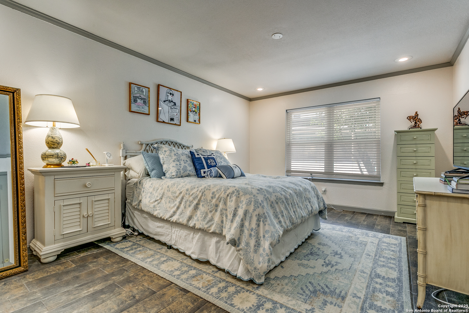 109 Ruelle Lane, Unit 109A San Antonio, TX 78209 - Photo 15 of 23 a bedroom with a large bed and a window